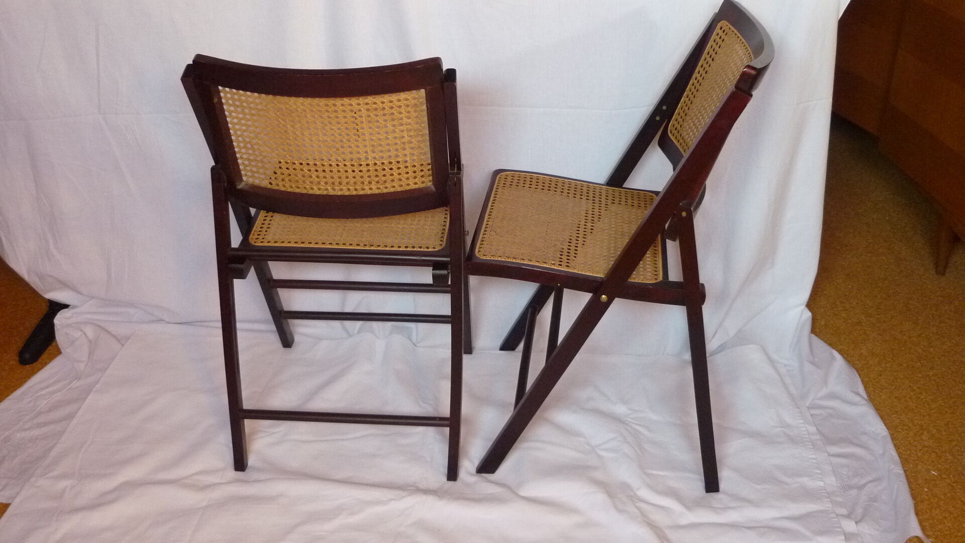 Duo of canned folding chairs