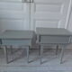 Duo of mismatched bedside tables green of gray