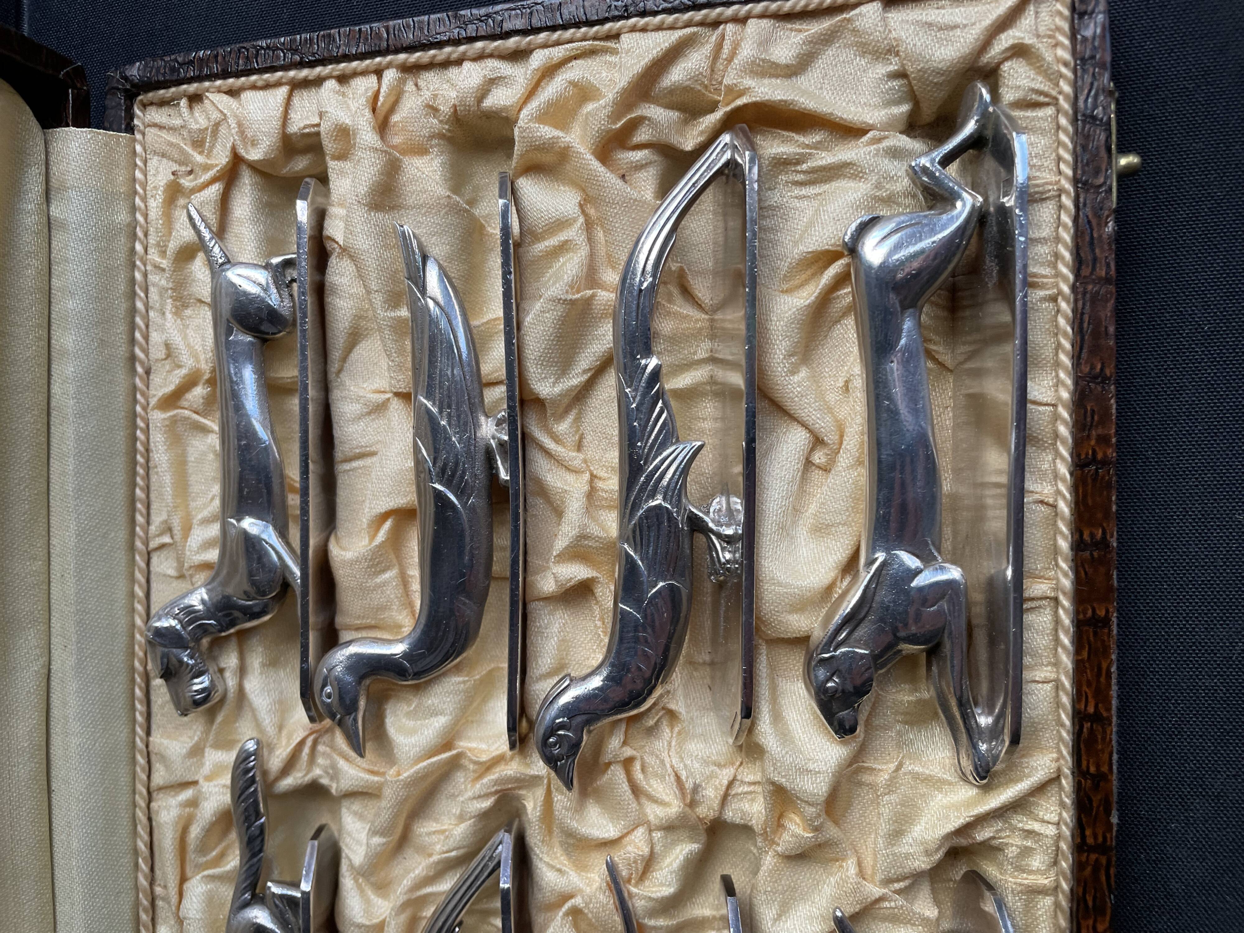 12 “Modern Animals” knife holders – Silvered bronze – Art Deco