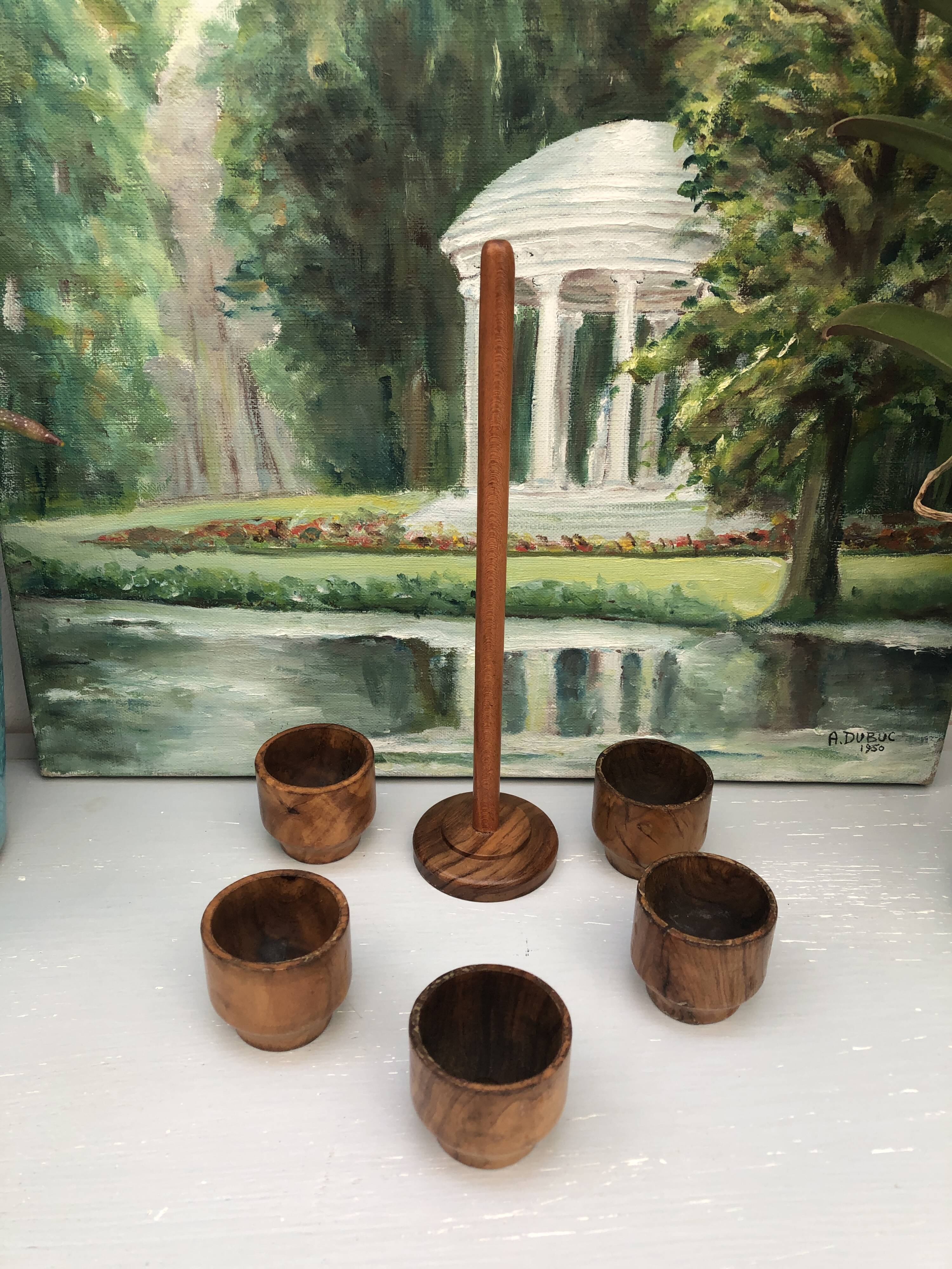 Five olive wood egg cups