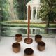 Five olive wood egg cups