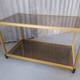 Gold metal coffee table and smoked glass
