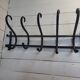 Antique coat rack in curved wood 5 hooks
