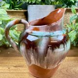 Old ceramic jug with glazed finish – flame decoration