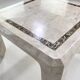 1970s-80s coffee table in stone marquetry and brass.