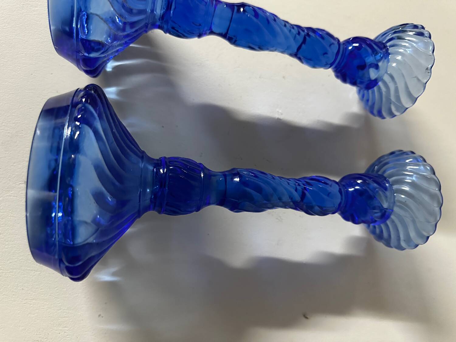 Pair of vintage cobalt blue twisted glass candlesticks h 24.5 cm
