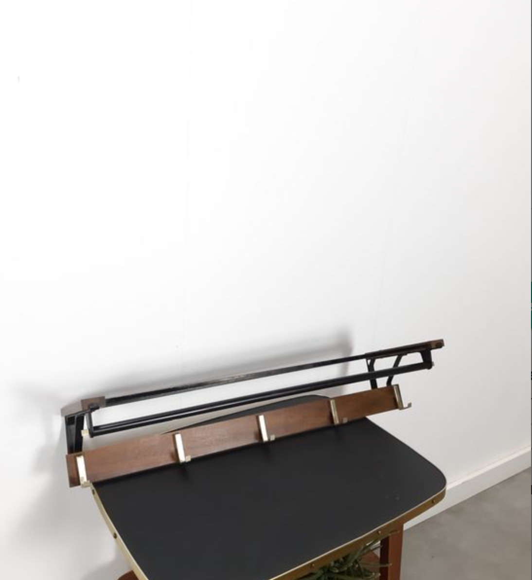 Vintage wooden wall coat rack with hooks and brass shelf