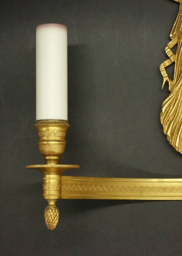 Large pair of wall sconces with winged caryatids in Empire style - gilded bronze