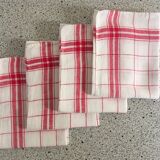 4 red mixed-race tea towels