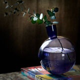 Purple vase inclined