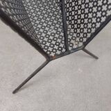 1950s magazine rack in perforated sheet metal