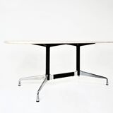 Travertine dining table by Charles & Ray Eames for Vitra, 1960s