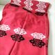 Vintage graphic red tablecloth and 8 matching napkins.