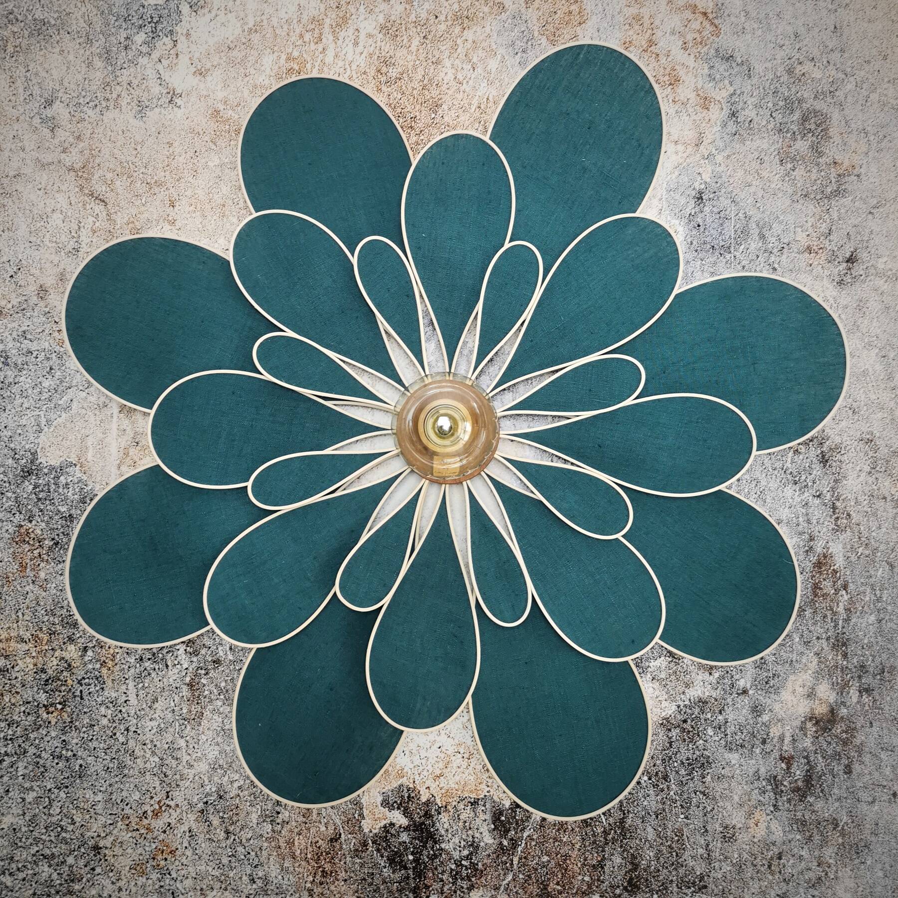 Peacock blue rattan and linen 24 petal flower wall light
