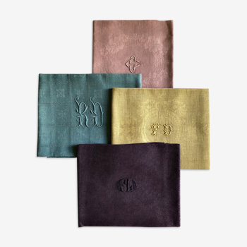 Suite of four tinted antique napkins