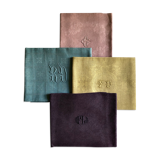 Suite of four tinted antique napkins