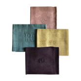 Suite of four tinted antique napkins