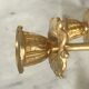 Pair of golden brass candlesticks