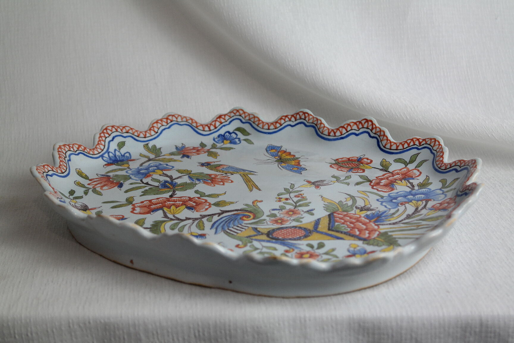 Flat earthenware of Rouen polychrome decoration cornucopia of plenty