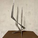 Brutalist candlestick in struck steel