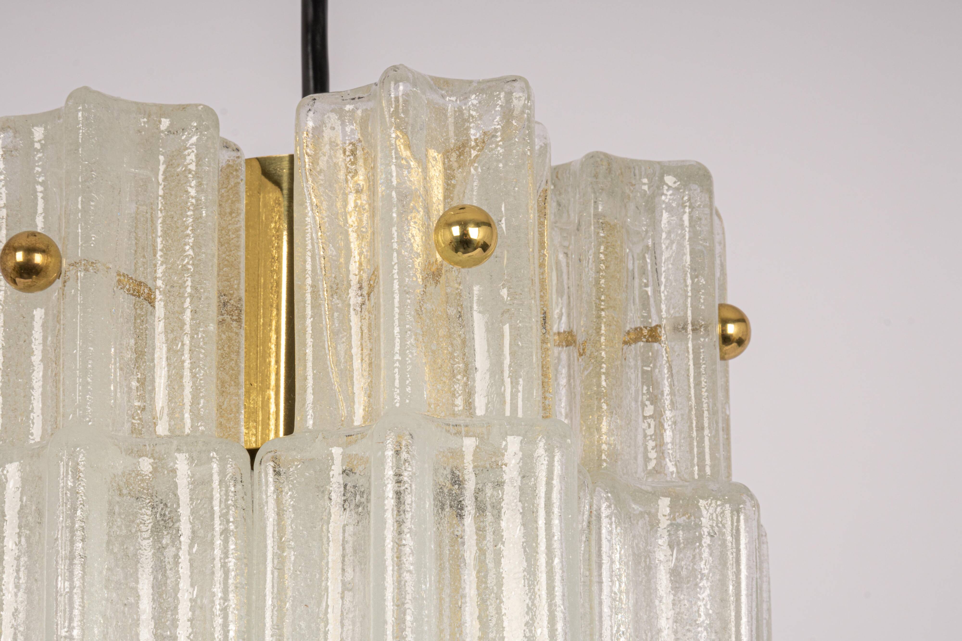 Pendant light with hand-blown glass pieces on a brass base made by Glashütte Limburg.