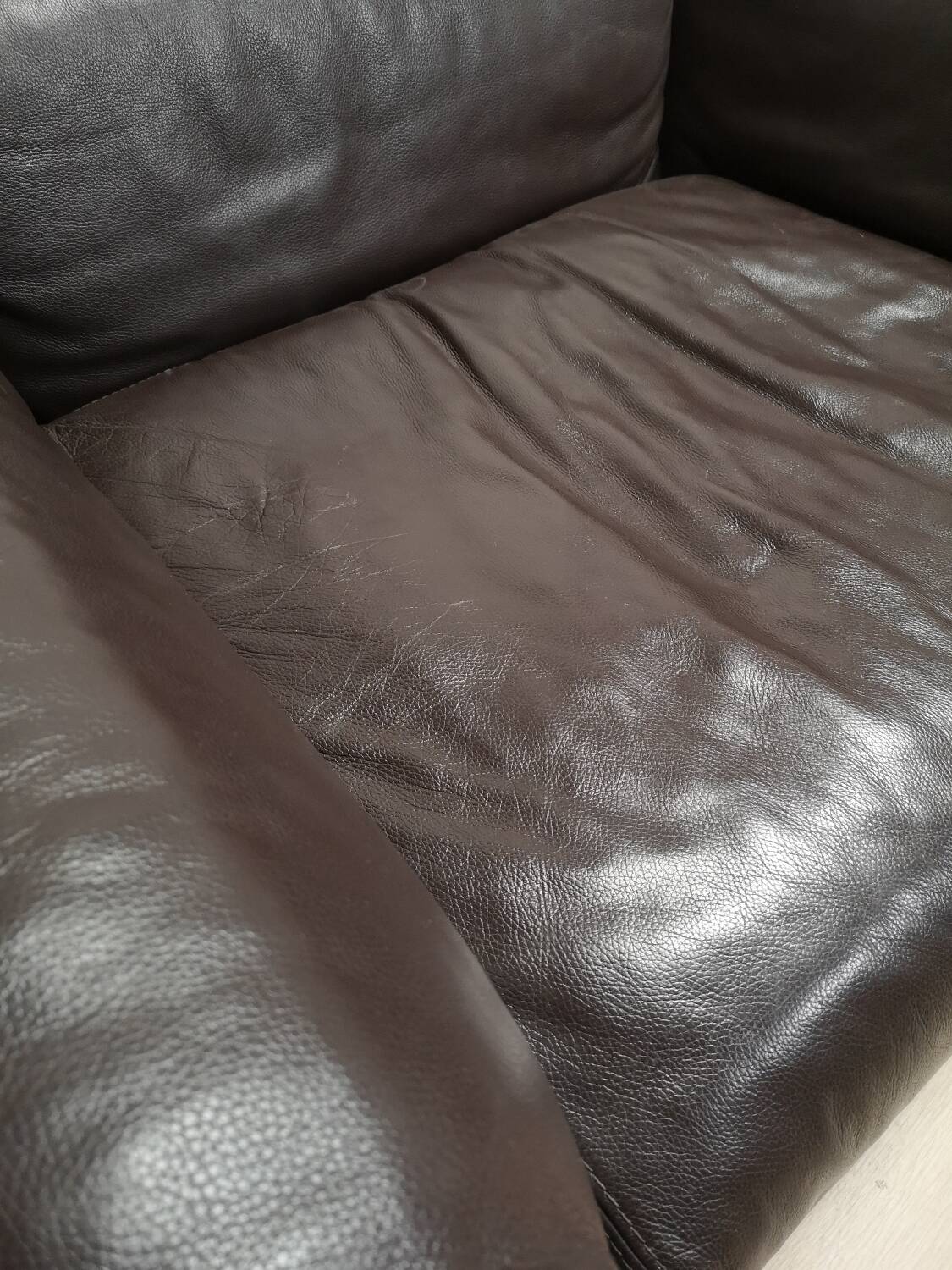 Roche Bobois armchair in brown leather