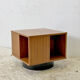 Rotating coffee table magazine holder