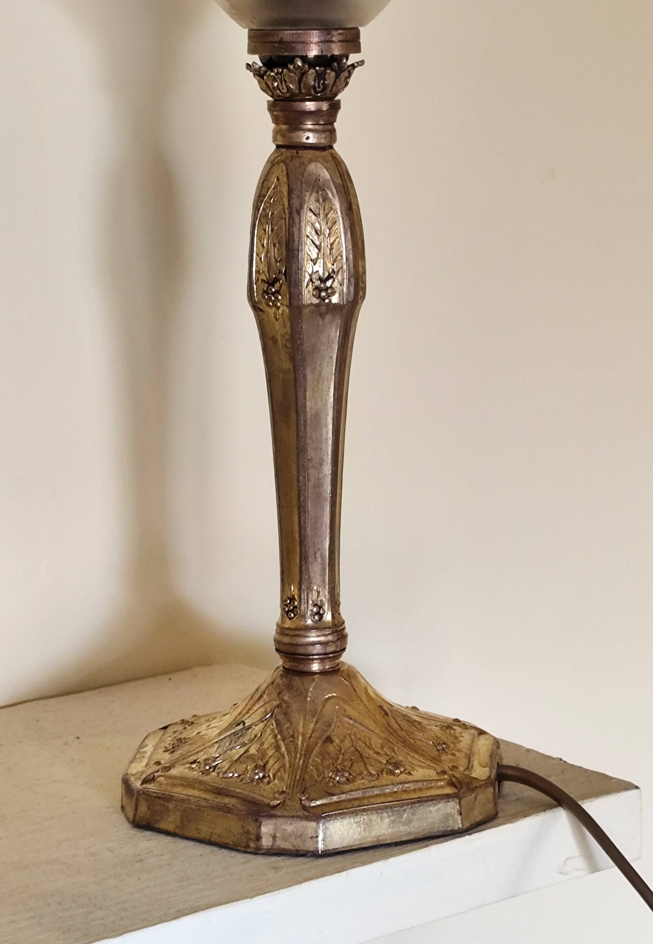 Lamp with a 19th-century chiseled bronze base and antique glass shade