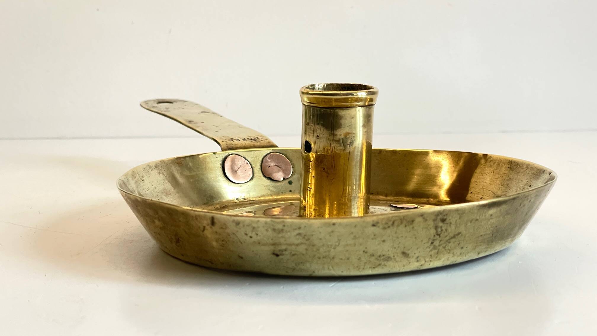 LOW HAND BRASS CANDLESTICK ANTIQUE