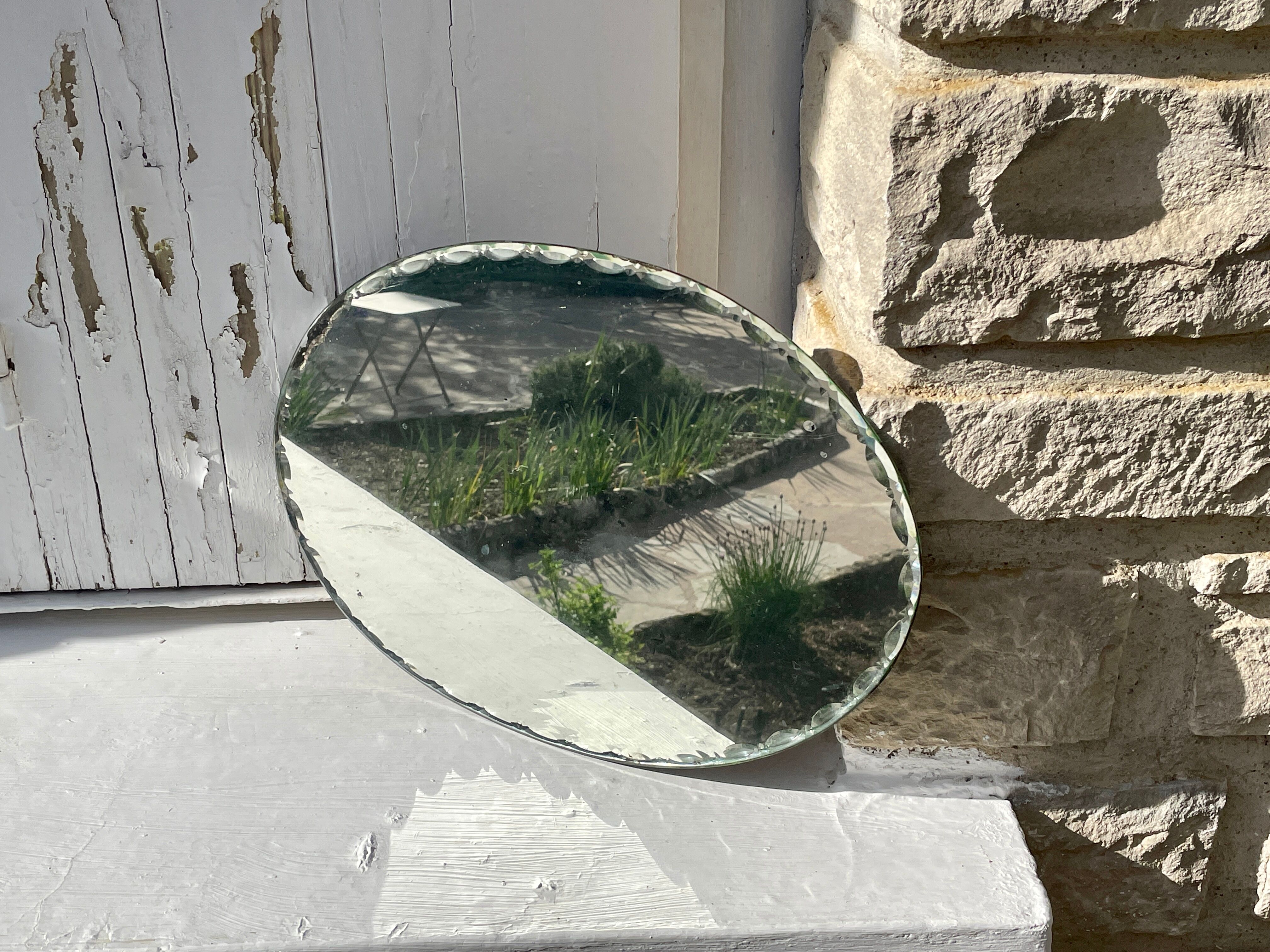 Vintage beveled mirror with mercury