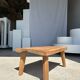 Coffee table in blond teak quadripod