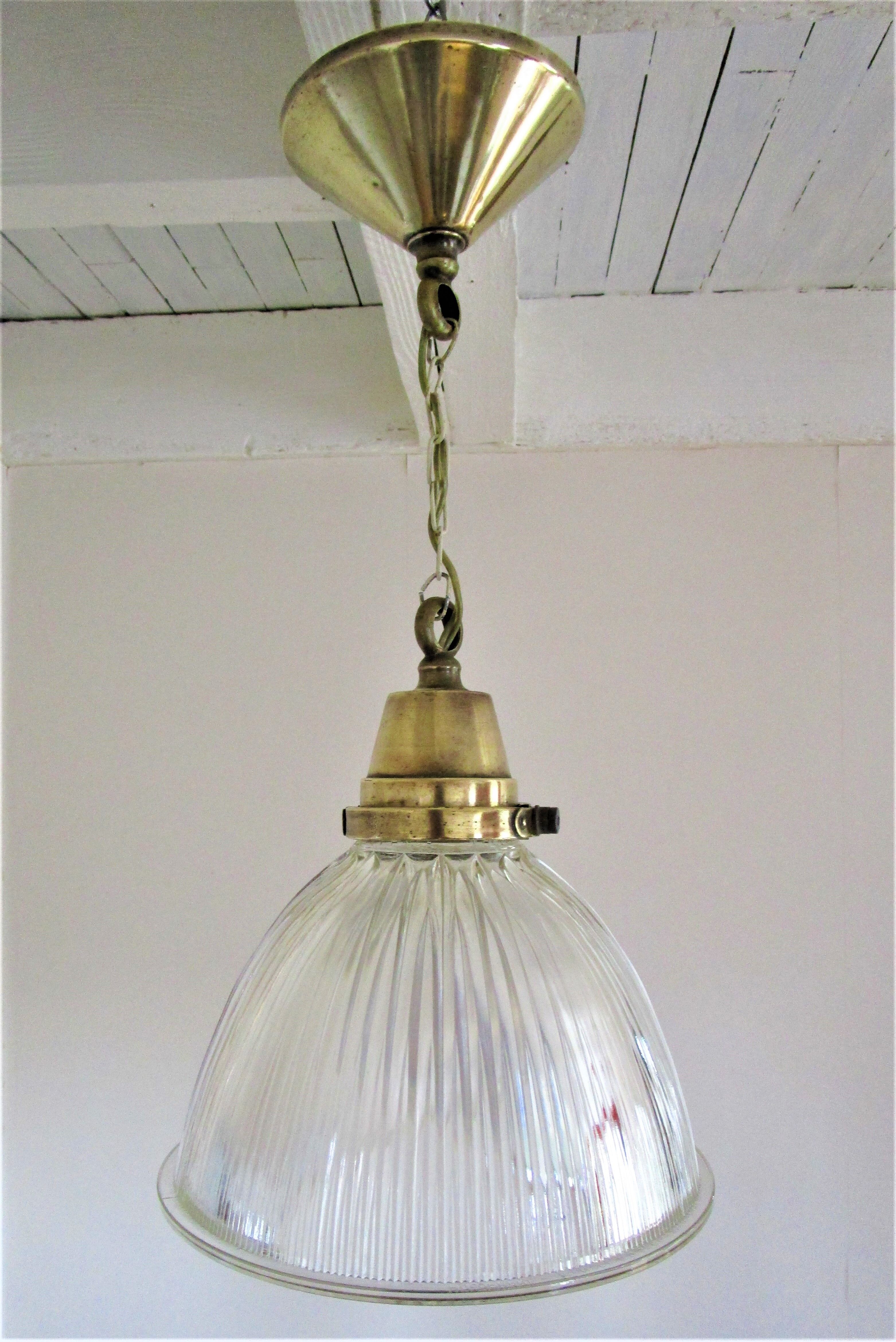 Holophane glass suspension and vintage patinated brass