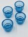 Set of 4 IKEA turquoise aquamarine glass candle holders.