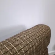 Vintage pull-out sofa bed, brown checked lounge chair with chrome.