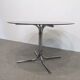 70s round table with smoked glass and chrome
