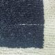 Tapis en laine noire
