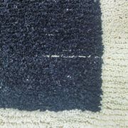 Tapis en laine noire