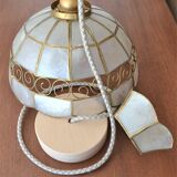 Mother-of-pearl and brass suspension