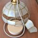 Mother-of-pearl and brass suspension