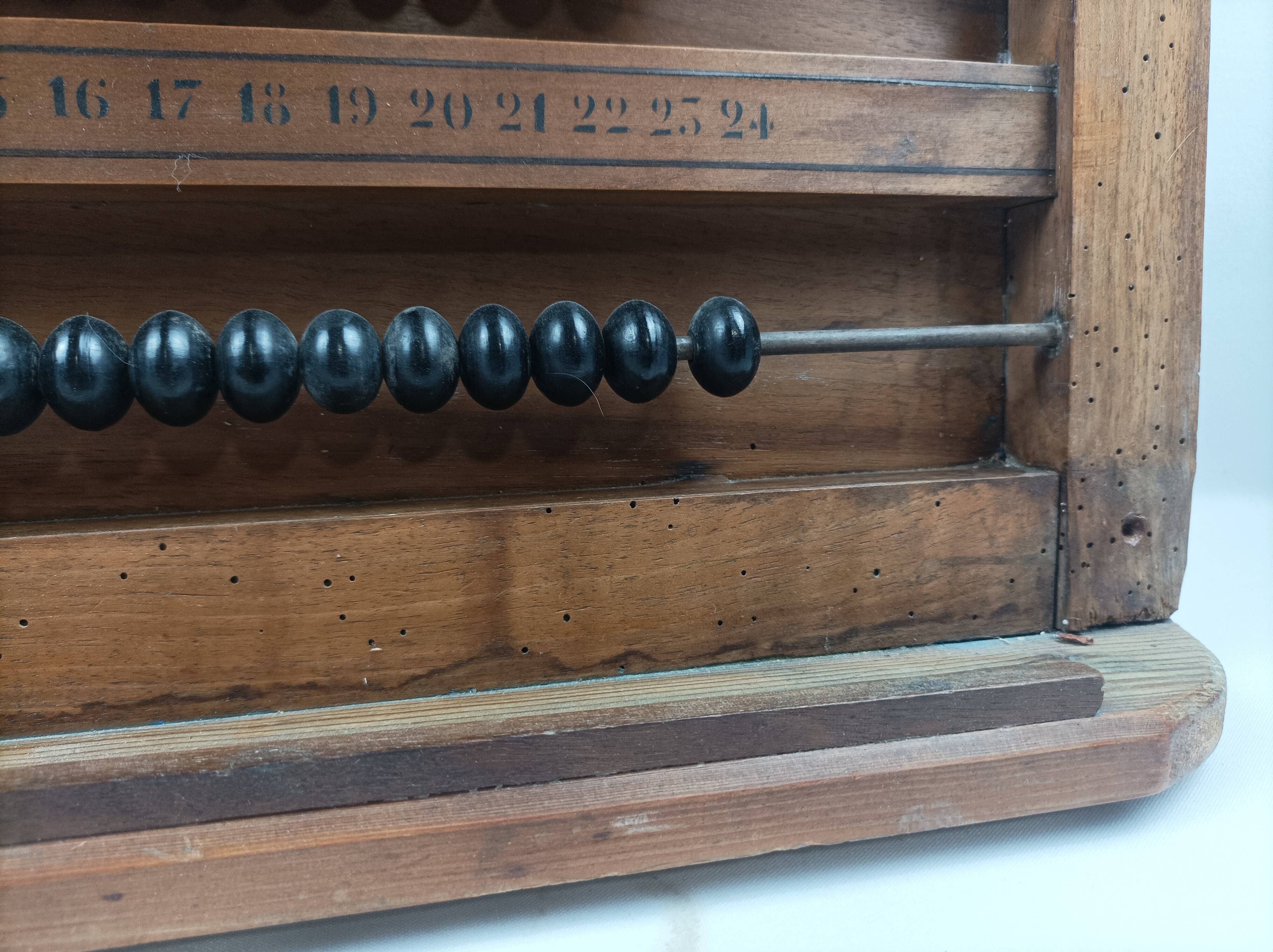 Old billiard abacus with branded slate