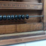 Old billiard abacus with branded slate