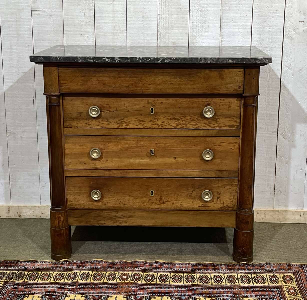 19th-century Empire commode in walnut with a grey St Anne marble top.