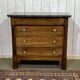 19th-century Empire commode in walnut with a grey St Anne marble top.