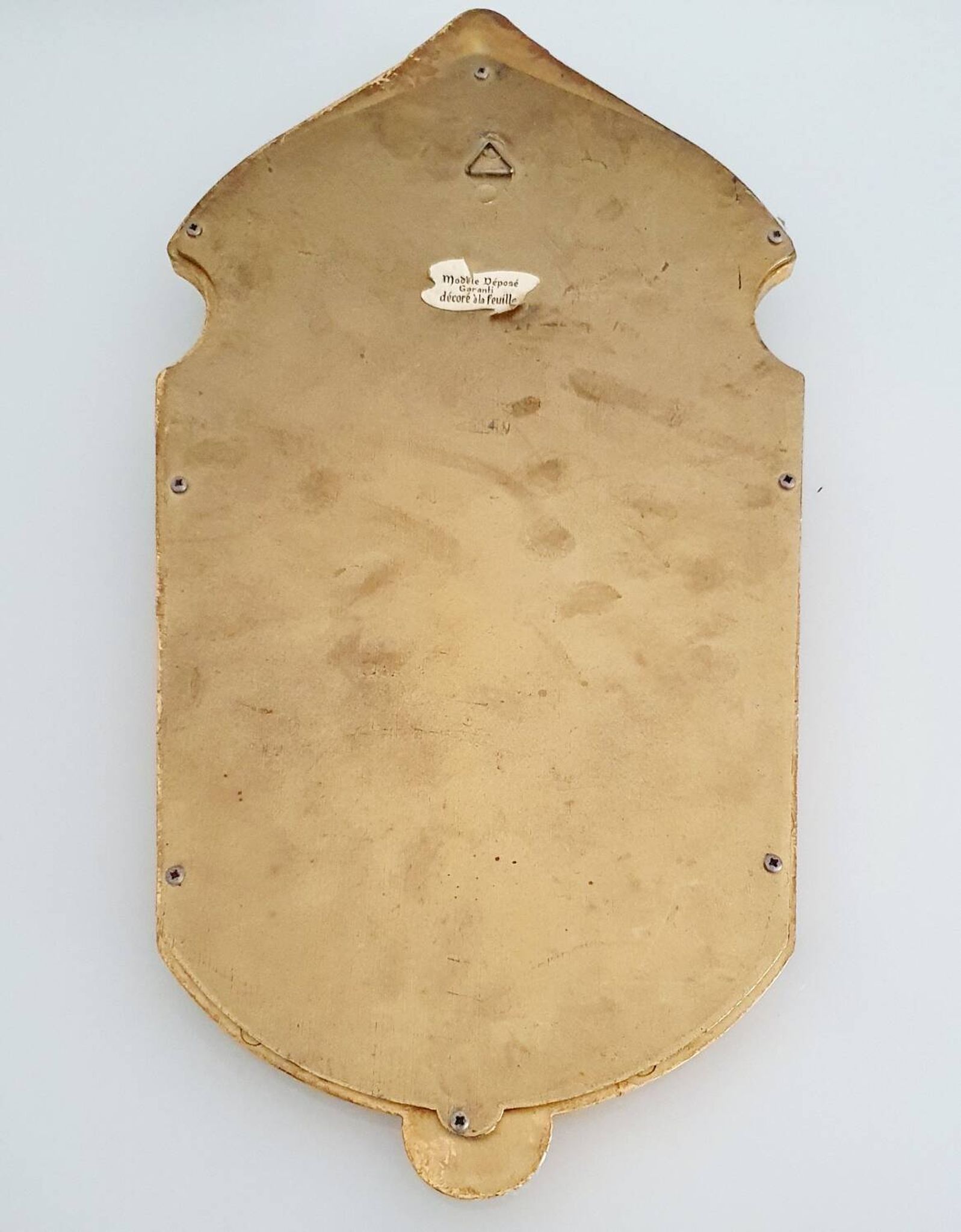Miroir en bois doré à la feuille d'or