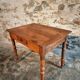 French vintage side table in cherry wood with a drawer.