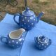 Lavender blue earthenware tea service with white polka dots from Digoin Sarreguemines.