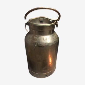 Old brass milk jug
