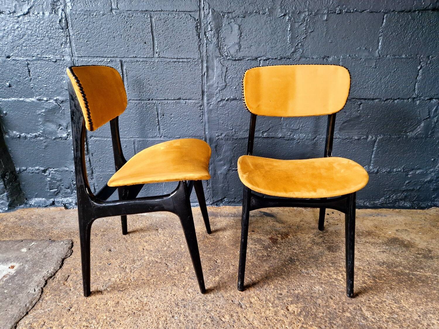 2 vintage chairs in black lacquered wood and yellow/mustard fabric, 1960