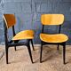 2 vintage chairs in black lacquered wood and yellow/mustard fabric, 1960