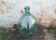 Give me an old green glass bottle jar.